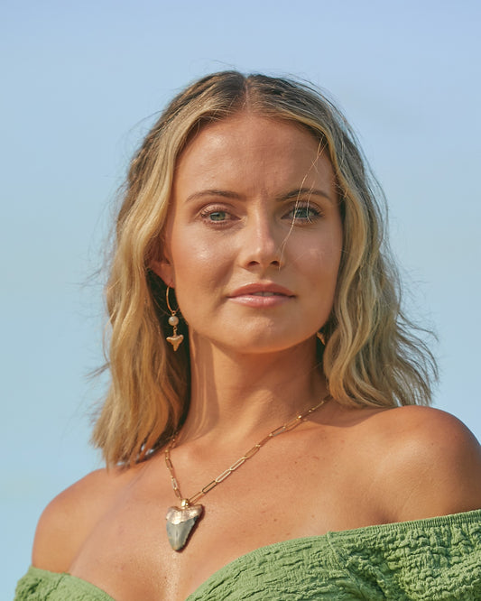 huge shark tooth necklace on paperclip gold chain modeled by taylor ann green-foxy fossils