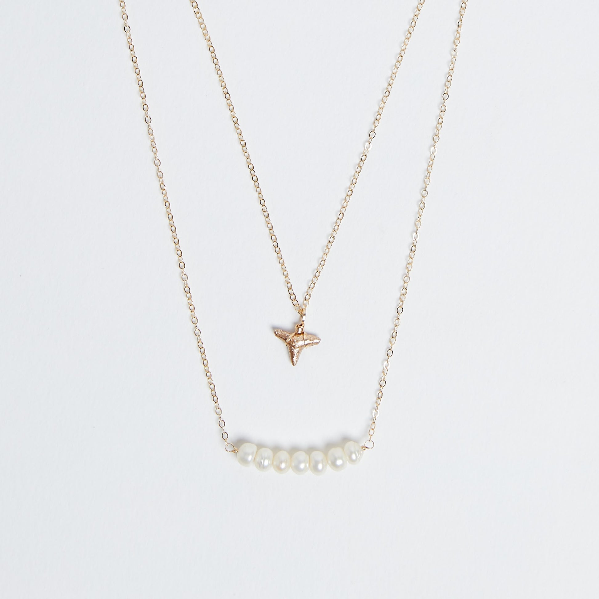Saltwater Reign - Foxy Fossils double layer gold shark tooth necklace with freshwater pearls bar pendant