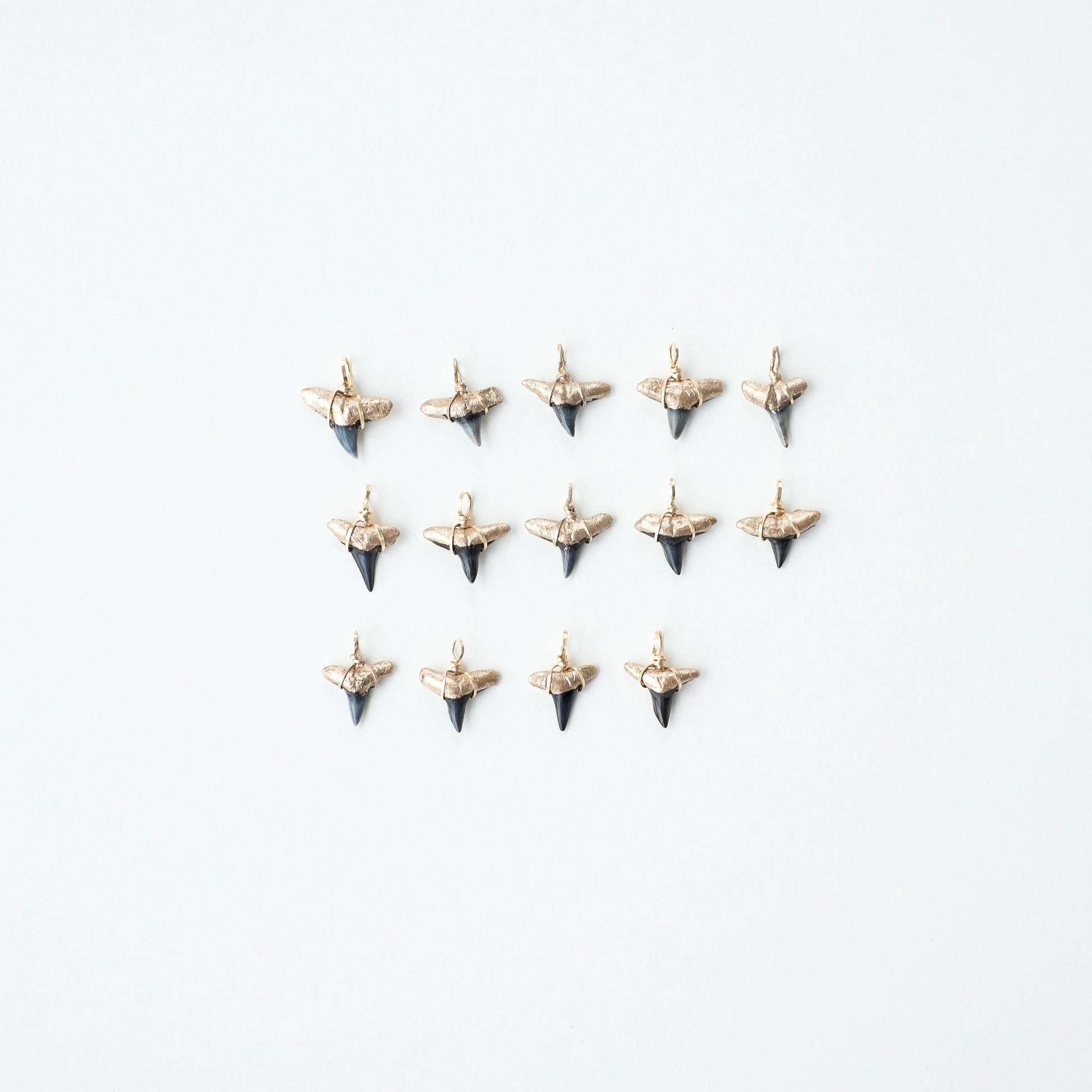 real shark tooth pendants in gold-prehistoric shark teeth gold dipped and wire wrapped into pendants for necklace