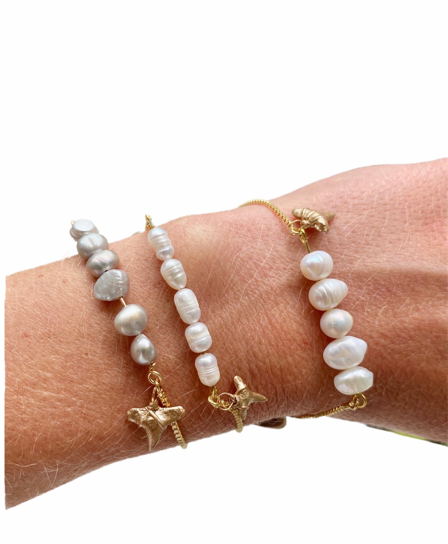gold shark tooth charm and pearl bracelets-group photo modeled on wrist-foxy fossils
